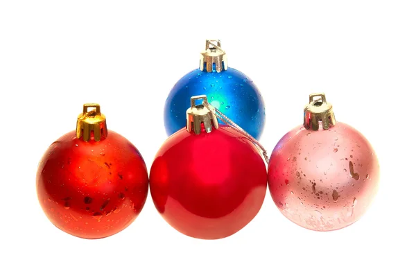 Vier gekleurde kerstballen. — Stockfoto