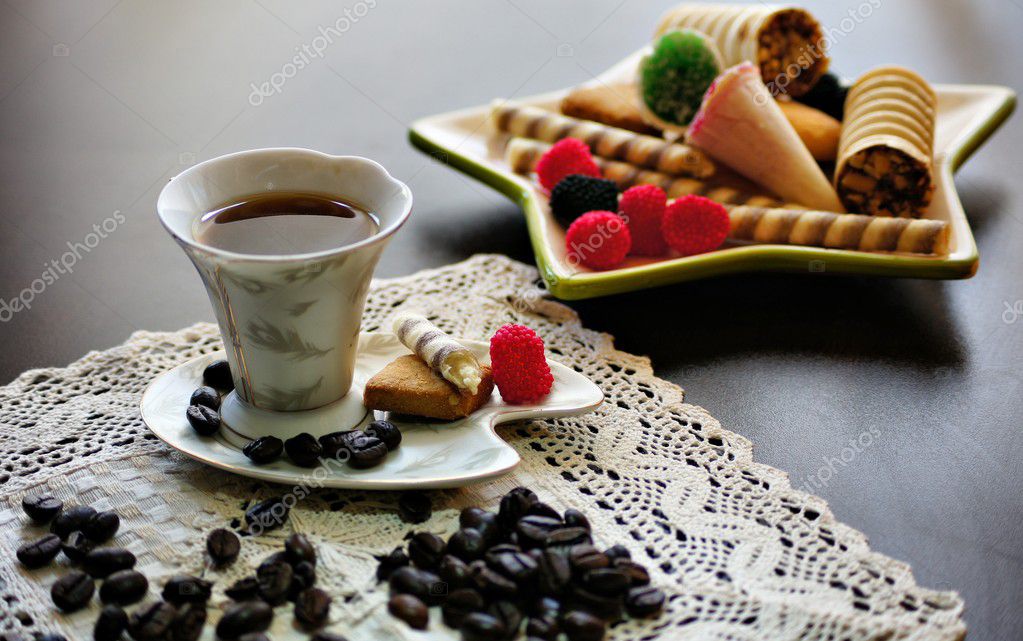 Cup of coffee with sweets — Stock Photo © Elet_1 6824728