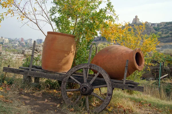 stock image Traditional georgian jugs for wine in Tbilisi castle wall