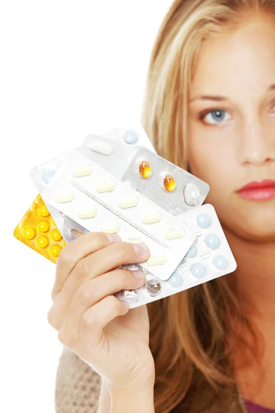 Ung vacker kvinna med piller. — Stockfoto