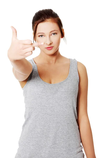 Teen girl with middle finger up — Stock Photo, Image
