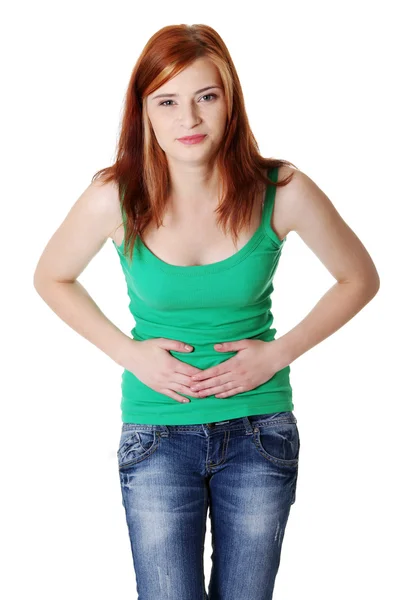 Dospívající dívka s bolesti žaludku. — Stock fotografie