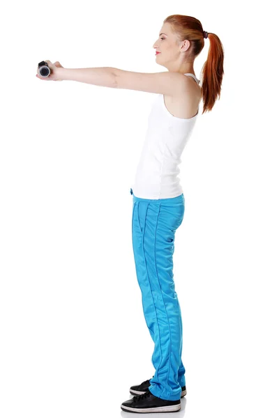 Teenie Mädchen macht Übungen. — Stockfoto