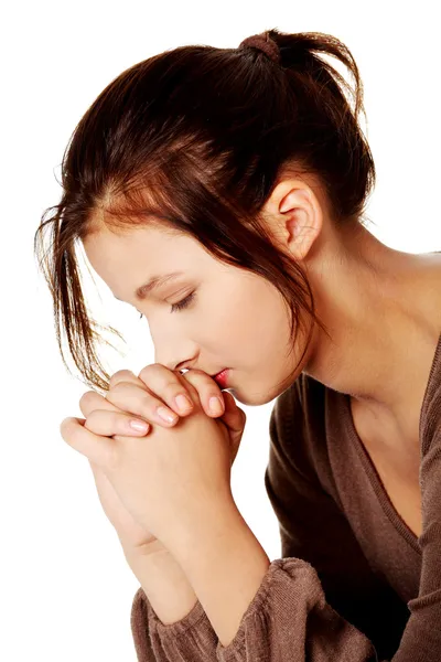 Hübsches Mädchen betet. — Stockfoto