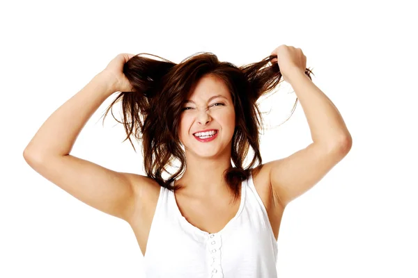 Őrült lány húzza a haját. — Stock Fotó
