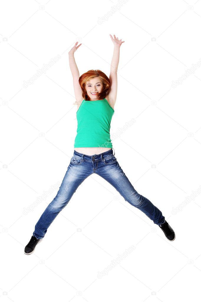 Teenage student jumping.
