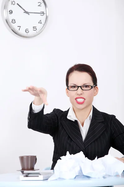 Mad businesswoman throwing paperball. — Stock Photo, Image