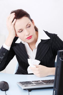 Beautiful business having a headache in office. clipart