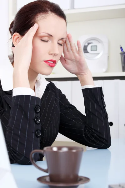 Businesswoman having headache. — Stock Photo, Image