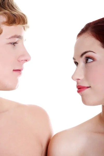 Young naked couple looking at each other. — Stock Photo, Image