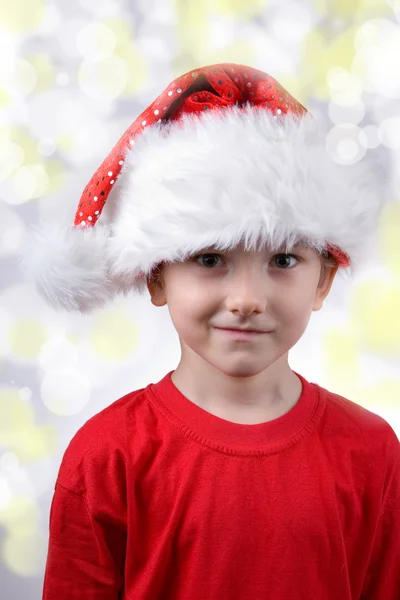 Enfant avec chapeau de Père Noël — Photo