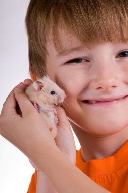 Boy with a hamster clipart