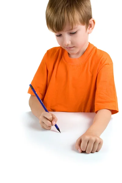 Chłopiec rysuje coś — Zdjęcie stockowe
