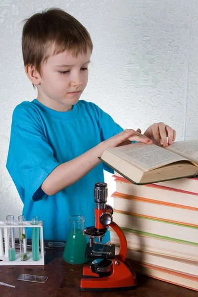 stock image Boy plays in the academic chemist