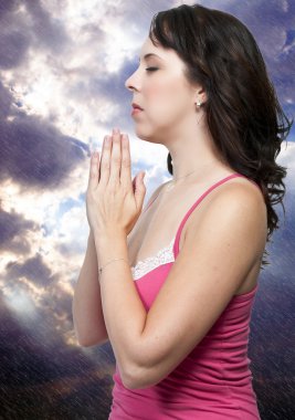 Woman praying clipart