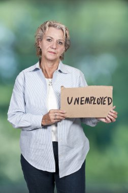 Woman Holding an Unemployment Sign clipart