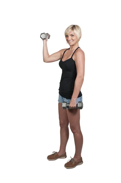 Frau, die mit Gewichten arbeitet — Stockfoto