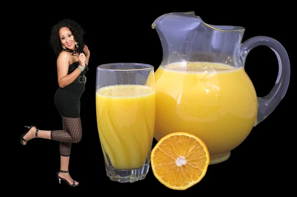 Mulher e suco de laranja — Fotografia de Stock