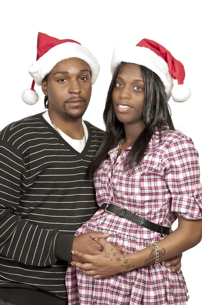 Svart par bär christmas santa hattar — Stockfoto