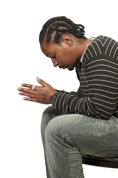 Чорна людина молиться — стокове фото