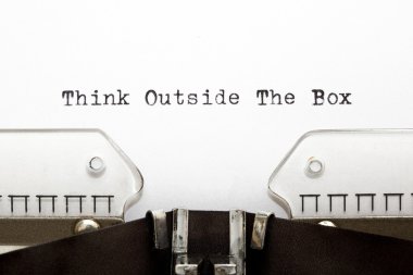 Typewriter THINK OUTSIDE THE BOX clipart