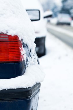 Car covered in snow clipart