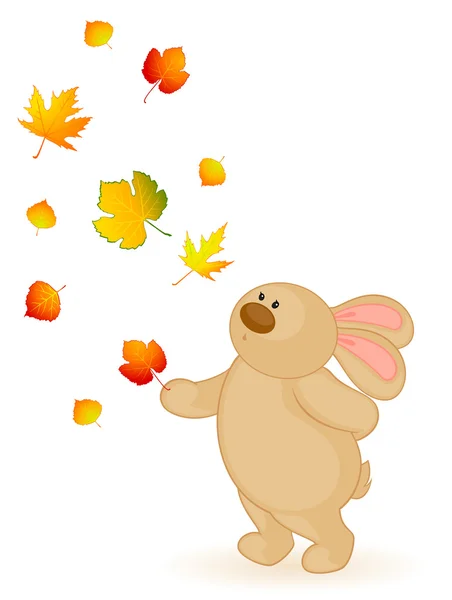 Dessin animé petit lapin jouet avec des feuilles automnales — Image vectorielle