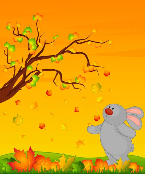 Cartoon kleine speelgoed konijntje met herfst bladeren — Stockvector