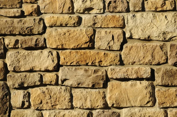 Ściana bloku nieregularne murarskie — Zdjęcie stockowe