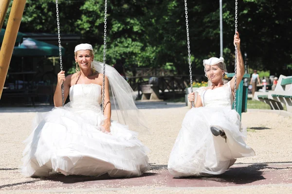 Beautiful brides outdoor Stock Image