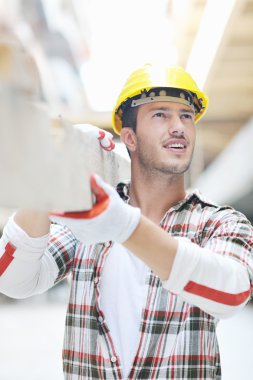 Hard worker on construction site clipart