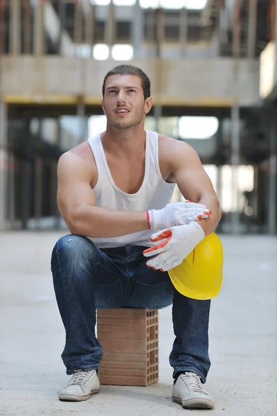Hard worker on construction site Stock Image