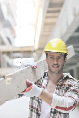 Hard worker on construction site clipart