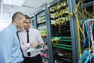 It engineers in network server room clipart