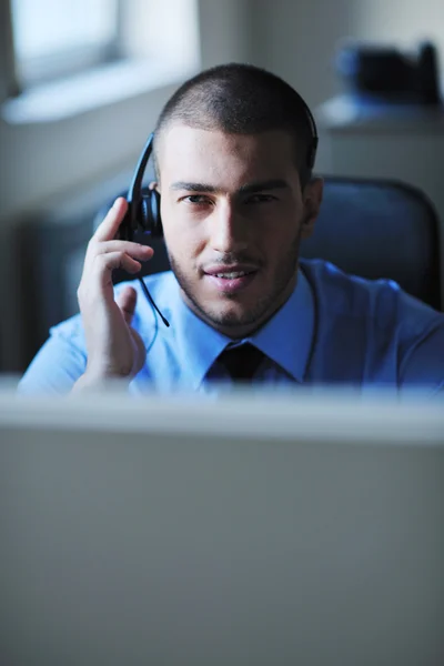 Businessman with a headset — Stock Photo, Image
