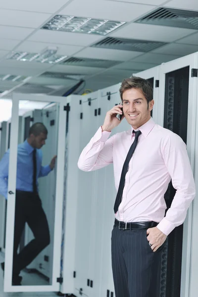 It engineers in network server room — Stock Photo, Image