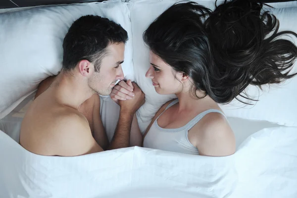 Young couple have good time in their bedroom — Stock Photo, Image
