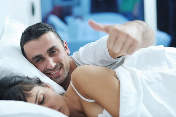Young couple have good time in their bedroom — Stock Photo, Image