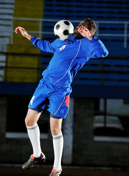 Fußballer in Aktion — Stockfoto