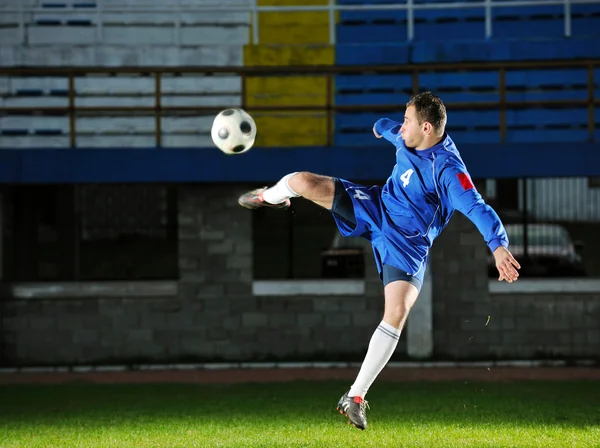 Fotbollsspelare i aktion — Stockfoto