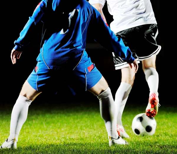 Football players in action for the ball — Stok fotoğraf