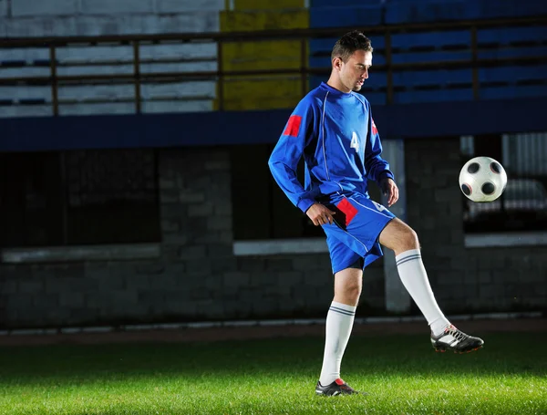 Voetbalspeler in actie — Stockfoto
