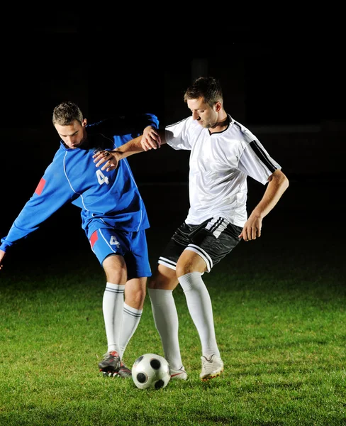Football players in action for the ball — Stockfoto