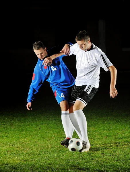 アクション ボールのためのフットボール選手 — ストック写真