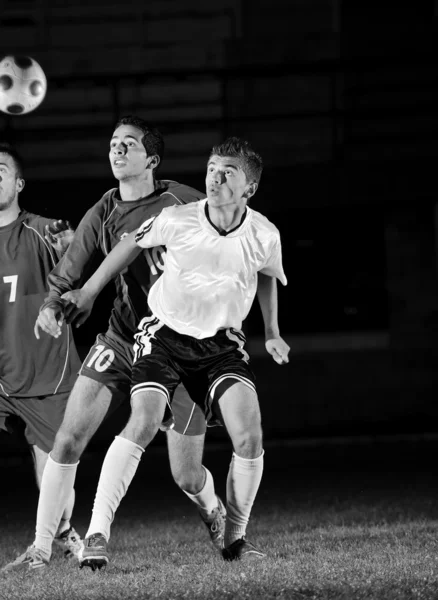 アクション ボールのためのフットボール選手 — ストック写真