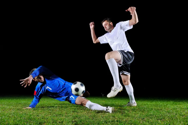 Fotbalisté v akci na míč — Stock fotografie