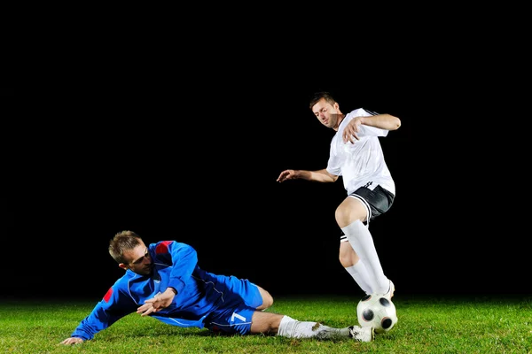 Football players in action for the ball — Stok fotoğraf