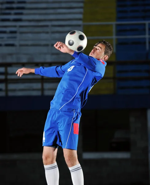 Jugador de fútbol en acción —  Fotos de Stock
