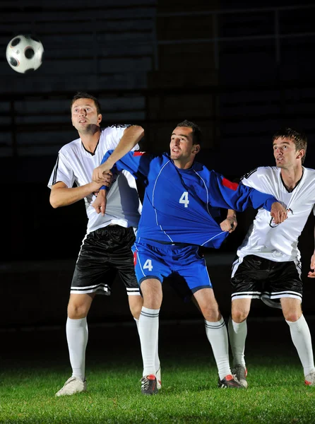 Ποδόσφαιρο παίκτες σε δράση για την μπάλα — Φωτογραφία Αρχείου