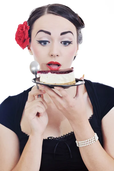 Hermosa joven comer pastel dulce — Foto de Stock